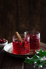 Mulled wine with cranberries, anise stars and cinnamon sticks