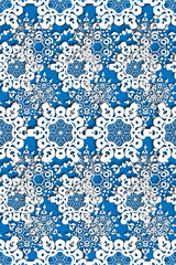 Seamless pattern lace from snowflakes . The Blizzard in the sky.