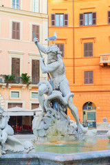 famous fountain Fontana del Nettuno XIX century at Piazza Navona in Rome, Italy