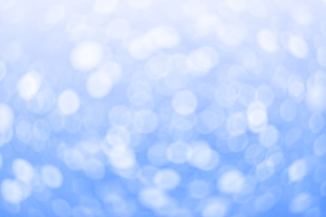 blue-white bokeh lights blurred abstract background
