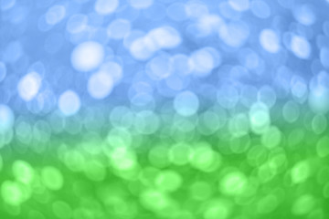 blue-green bokeh lights blurred abstract background