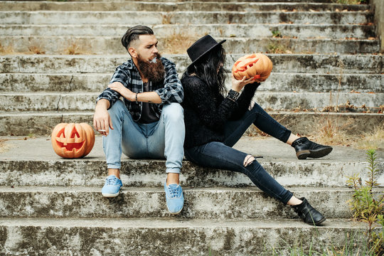 halloween couple with pumpkin