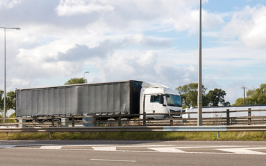 Fototapeta na wymiar Articulated lorry on the motorway