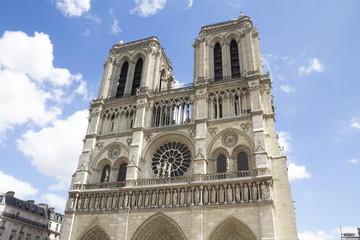 Fototapeta na wymiar Paris, France - famous Notre Dame cathedral facade saint statues. UNESCO World Heritage Site.
