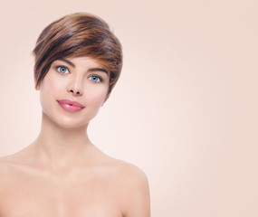 Beautiful young spa woman with short hair portrait