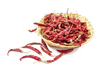 Fototapeta premium Dry red chili in the basket isolated on white background.Dried r