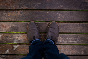 working man shoes on wooden floor with copy space