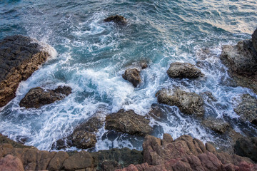 Sponge water waves on Rocks Beach, Beautiful tropical beach,Crys