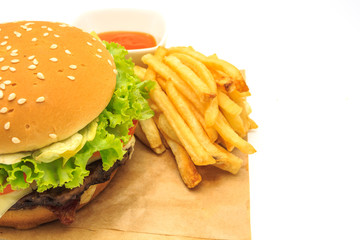 tasty hamburger, French fries and chili sauce isolated on white background, Fast food with copy space