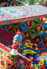 Close-up view of a colorful detail of a typical sicilian cart