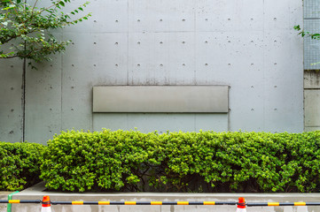 Large blank billboard on a street wall, banners with room to add your own text