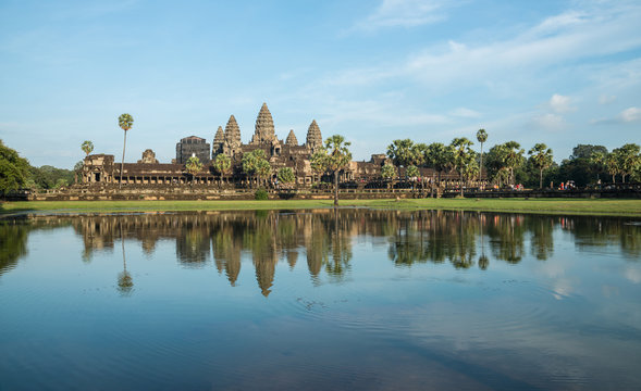 The reflection of Angkor wat is a temple complex in Cambodia and the largest religious monument in the world, with the site measuring 162.6 hectares.
