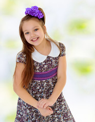 Beautiful little girl with long hair