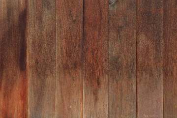 Naklejka premium rustic weathered barn wood background with knots and nail holes