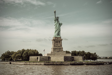 Statue of Liberty on Liberty Island on a sunny day, New York City, USA, vintage filtered style