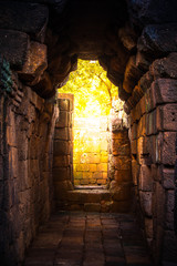 tunnel  golden light in rock castle ancient