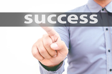 Businessman hand touching success on virtual screen