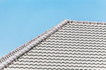 Roof on a background of blue sky