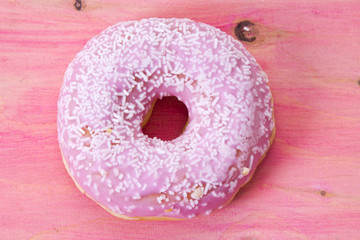 donuts pink on pink wood