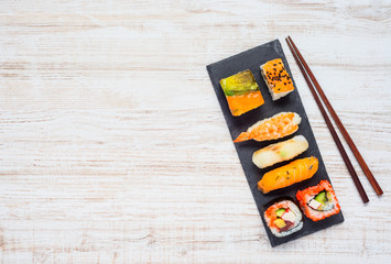 Sushi on Plate with Chopsticks and Copy Space Area