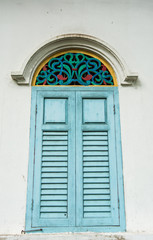 The traditional blue windows and frames of  buddhist temple,  Chanthaburi, Thailand.