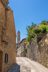 Naklejka premium Montalcino, Italy. Landscape with a bell tower in the old town