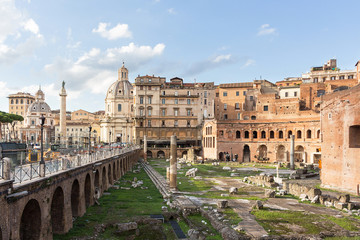 Obraz na płótnie Canvas Roman forum ancient ruins in Rome with view on Trajan column, Italy