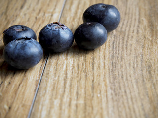 Blueberries on wood background
