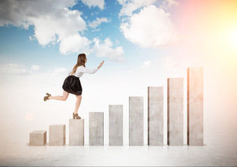 Woman running up the graph pillars