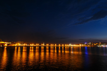 Fototapeta na wymiar The night sky over the sea in Nessebar Bulgaria