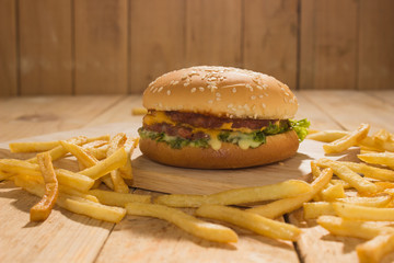 Burger and Fries placed on the do not eat a lot of fat