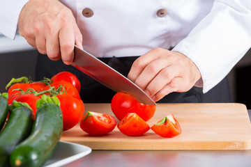 Chef chopping vegetables
