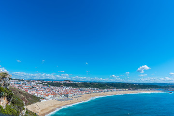 Fototapeta na wymiar Nazare, a surfing paradise town - Nazare, Portugal