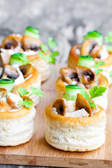 vol-au-vents  puff pastry cases filled with mushrooms and chicke