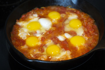 Shakshouka - fried eggs with tomatoes, Israeli national dish.