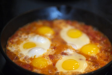 Shakshouka - fried eggs with tomatoes, Israeli national dish.