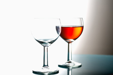 Wine in the glasses, light background
