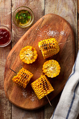 Barbecue Corn on Rustic Wooden Table