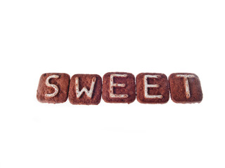 letter cookies spelling the word sweet