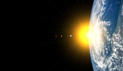Sun and our earth - Elements of this image furnished by NASA