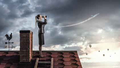 She is looking forward . Mixed media