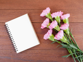 Blank notebook and Carnation flower 14