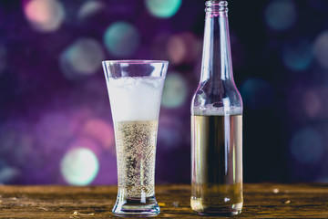 Glass of light beer with bubbles