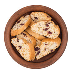 Cookies with raisins in a ceramic plate. Isolated on white backg