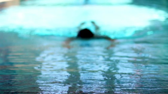 Man Swimmer Gets Out Of Water In Luxurious Swimming Pool