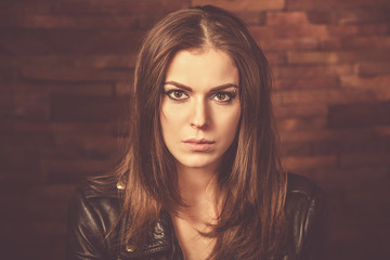 Fototapeta premium Stylish woman with leather jacket