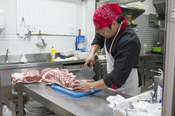 Hispanic cook in diner kitchen