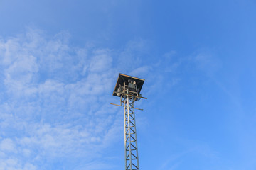 Loudspeakers broadcast ,blue sky background