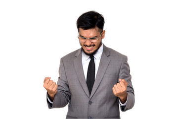 Portrait of sucessful asian businessman celebrating with hand up isolated on white bacground