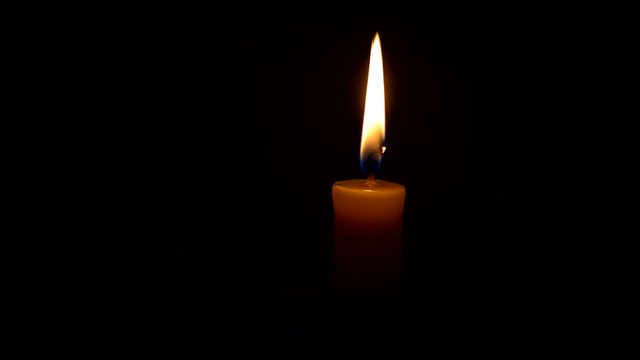 The candle burns quickly. 4K video. Timelapse. 